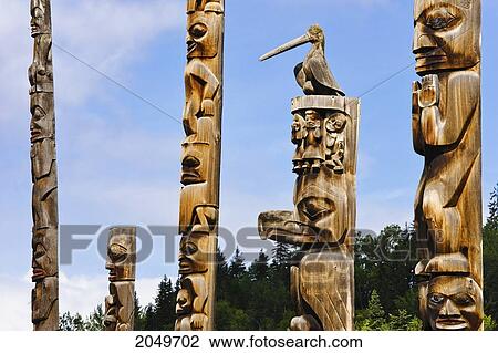 Stock Image - Totem Poles, Kitwanga, Northern British Columbia. Fotosearch