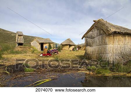 Stock Image - Totora Reed Houses On Chisawa, A Reed Island Made By The Urus Iruitos People In Titicaca Lake, Bolivia. Fotosearch