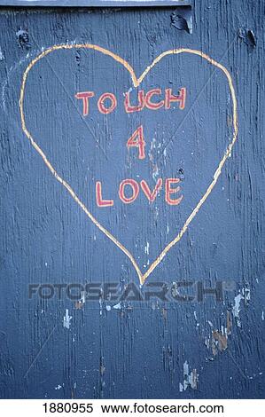 Stock Photography - Touch For Love Heart Graffiti On A Wall, Copenhagen. Fotosearch
