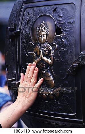 Touching A Sacred Image At The Great Buddha, Close Up View Large Photo Image Stock Image - Touching A Sacred Image At The Great Buddha, Close Up. Fotosearch