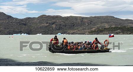 Stock Photo - Tour boat in Grey Lake, Torres del Paine National Park; Torres del Paine, Magallanes and Antartica Chilena Region, Chile. Fotosearch