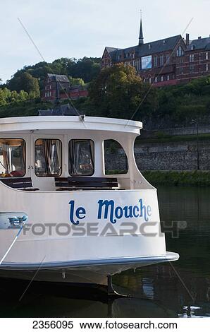 Tour boat on River Meuse; Dinant, Ardennes, Belgium View Large Photo Image Stock Photography - Tour boat on River Meuse; Dinant, Ardennes, Belgium. Fotosearch