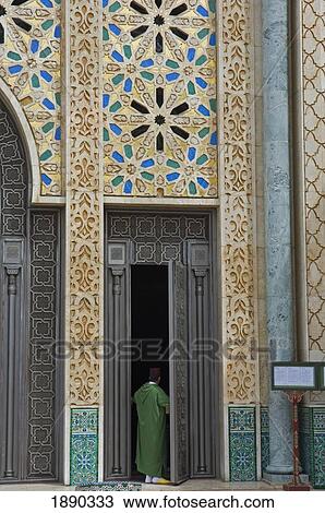 Stock Image - Tour Guide At The Hassan Ii Mosque. Fotosearch