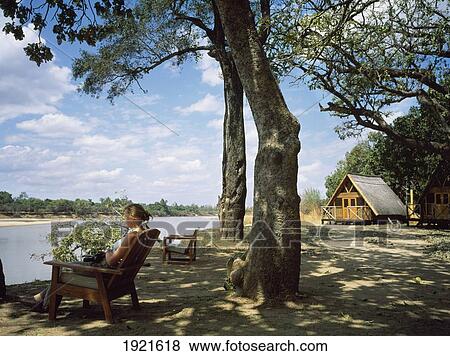 Tourist And Lodge, Safari View Large Photo Image Stock Photo - Tourist And Lodge, Safari. Fotosearch