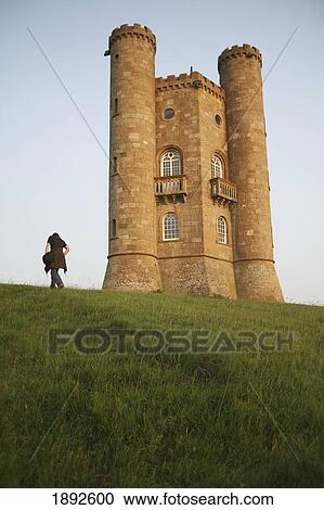 Stock Image - Tourist At Broadway Tower, Second Highest Point In The Cotswolds. Fotosearch