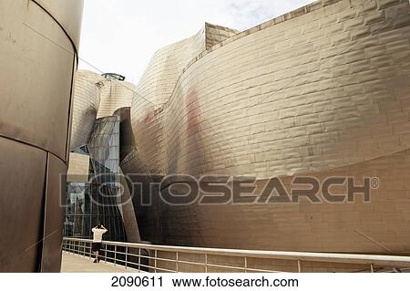 Stock Image - Tourist At Guggenheim Museum In Bilbao, Basque Country, Spain. Fotosearch