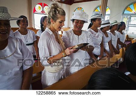 Stock Photography - Tourist atending church; Savaii Island, Samoa. Fotosearch