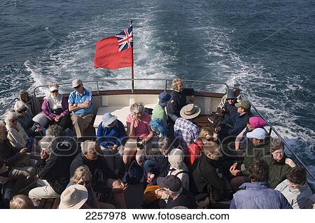 Tourist Boat Leaving Island Of Treso, Isles Of Scilly. View Large Photo Image Stock Photo - Tourist Boat Leaving Island Of Treso, Isles Of Scilly.. Fotosearch