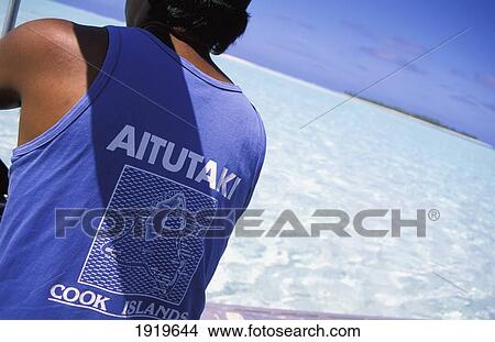 Tourist Boat Skippert; Aitutaki Lagoon, Cook Islands View Large Photo Image Picture - Tourist Boat Skippert; Aitutaki Lagoon, Cook Islands. Fotosearch