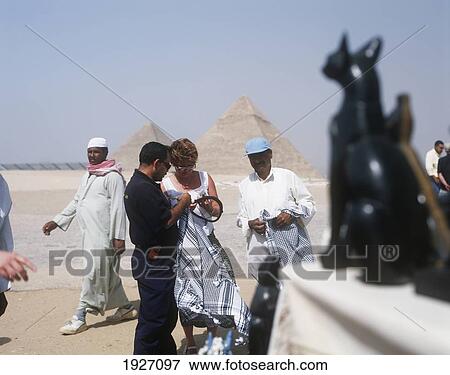 Tourist Buying Souveneirs View Large Photo Image Stock Photo - Tourist Buying Souveneirs. Fotosearch
