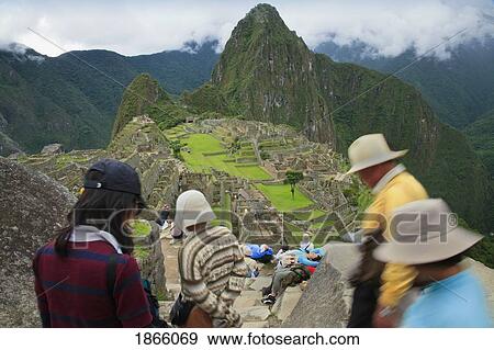 Stock Photo - Tourist Group Descending Steps, Machu Picchu, Peru. Fotosearch