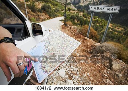 Tourist In Car Checking Map, Close Up View Large Photo Image Stock Image - Tourist In Car Checking Map, Close Up. Fotosearch