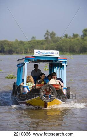 Stock Photograph - Tourist On Boat Trips In The Mekong Delta Close To Vinh Long, Vietnam.. Fotosearch