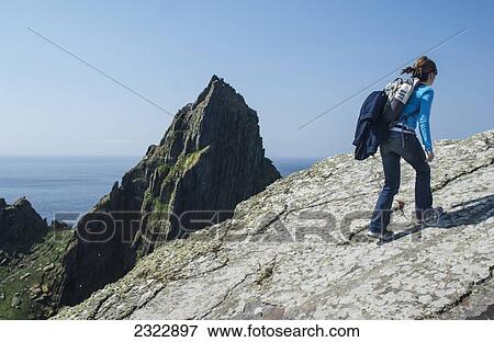Tourist on top of Skellig Michael; Skellig Islands, County Kerry, Ireland, UK View Large Photo Image Stock Photo - Tourist on top of Skellig Michael; Skellig Islands, County Kerry, Ireland, UK. Fotosearch