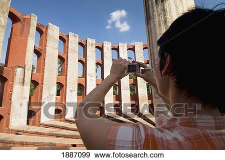 Tourist Photographing The Jantar Mantar Observatory, Rear View View Large Photo Image Stock Photo - Tourist Photographing The Jantar Mantar Observatory, Rear View. Fotosearch