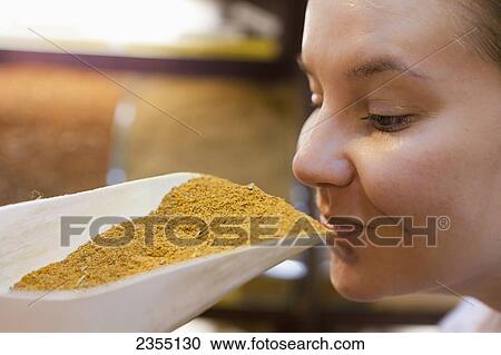 Tourist smelling the spices at the Spice Bazaar; Istanbul, Turkey View Large Photo Image Stock Image - Tourist smelling the spices at the Spice Bazaar; Istanbul, Turkey. Fotosearch