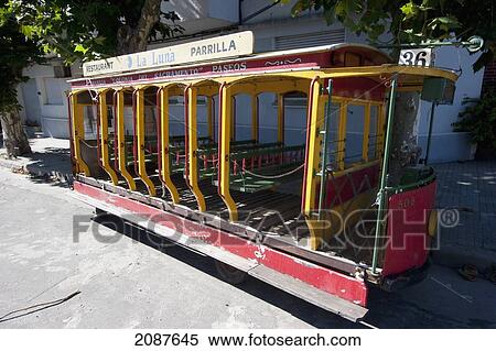 Tourist Tram On 18 De Julio, Colonia, Uruguay View Large Photo Image Stock Photography - Tourist Tram On 18 De Julio, Colonia, Uruguay. Fotosearch