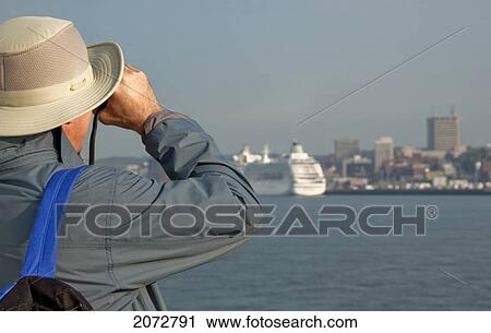 Tourist Viewing Ships In Saint John Harbour, New Brunswick View Large Photo Image Stock Image - Tourist Viewing Ships In Saint John Harbour, New Brunswick. Fotosearch