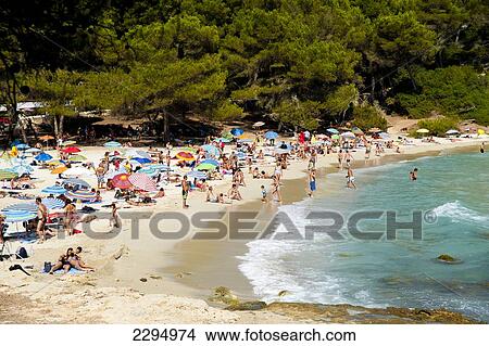 Picture - Tourists At Cala Macarella, Menorca, Balearic Islands, Spain. Fotosearch