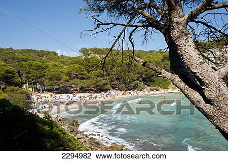 Stock Image - Tourists At Cala Macarella, Menorca, Balearic Islands, Spain. Fotosearch