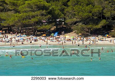 Tourists At Cala Macarella, Menorca, Balearic Islands, Spain View Large Photo Image Stock Image - Tourists At Cala Macarella, Menorca, Balearic Islands, Spain. Fotosearch