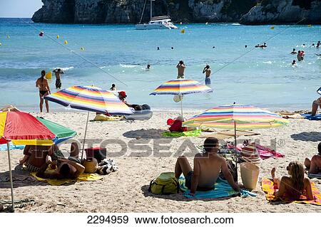 Stock Photo - Tourists At Cala Macarella, Menorca, Balearic Islands, Spain. Fotosearch