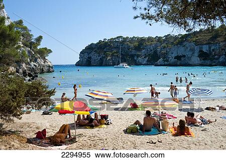 Stock Photography - Tourists At Cala Macarella, Menorca, Balearic Islands, Spain. Fotosearch