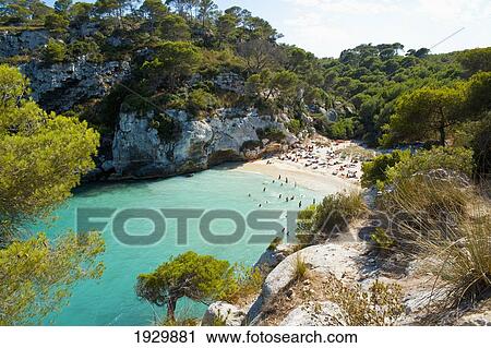 Tourists At Cala Macarelleta, Menorca, Balearic Islands, Spain View Large Photo Image Stock Image - Tourists At Cala Macarelleta, Menorca, Balearic Islands, Spain. Fotosearch