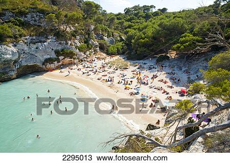 Tourists At Cala Macarelleta, Menorca, Balearic Islands, Spain View Large Photo Image Stock Image - Tourists At Cala Macarelleta, Menorca, Balearic Islands, Spain. Fotosearch