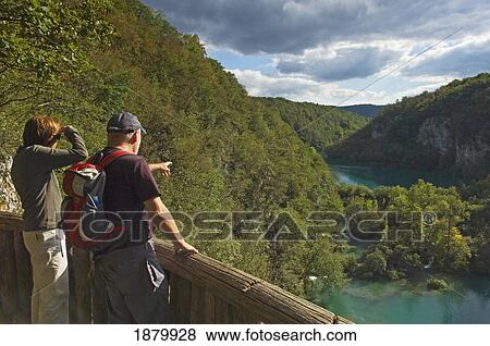 Tourists At Plitvice National Park. View Large Photo Image Stock Photo - Tourists At Plitvice National Park.. Fotosearch