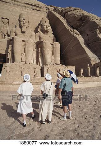 Stock Photo - Tourists At Ramses Statues. Fotosearch