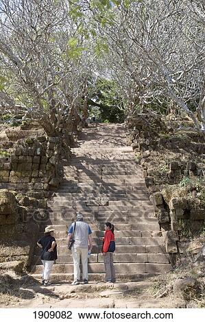 Tourists At Ruins Of Wat Phu Champasak, Savannakhet, Southern Laos View Large Photo Image Stock Image - Tourists At Ruins Of Wat Phu Champasak, Savannakhet, Southern Laos. Fotosearch