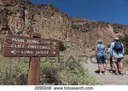 Tourists At The Bandelier National Monument, Former Homeland To The Ancestral Pueblo People In Los Alamos, New Mexico View Large Photo Image Stock Photo - Tourists At The Bandelier National Monument, Former Homeland To The Ancestral Pueblo People In Los Alamos, New Mexico. Fotosearch