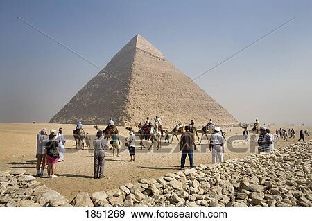 Stock Photo - Tourists At The Pyramid. Fotosearch