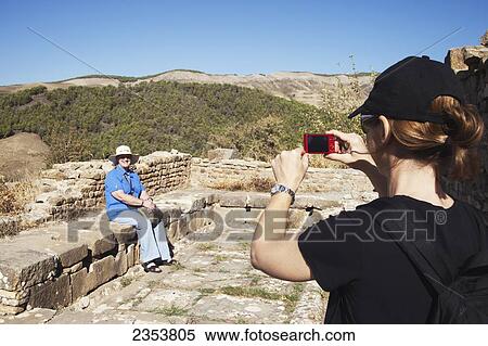 Tourists at the ruined public latrine, near the Old Forum; Djemila, Algeria View Large Photo Image Stock Photography - Tourists at the ruined public latrine, near the Old Forum; Djemila, Algeria. Fotosearch