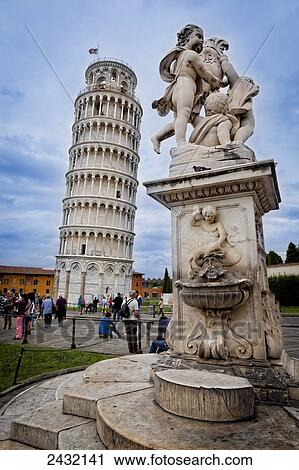 Stock Image - Tourists at the Tower of Pisa; Pisa, Tuscany, Italy. Fotosearch