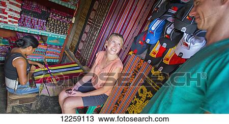 Tourists buying souvenirs in Dili markets; Dili, Timor-Leste View Large Photo Image Stock Image - Tourists buying souvenirs in Dili markets; Dili, Timor-Leste. Fotosearch