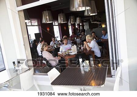 Picture - Tourists Eating At Vovo Telo Pizzaria In Port Elizabeth; Vovo Telo Pizzaria, Port Elizabeth, Garden Route, South Africa, &#13; &#10. Fotosearch