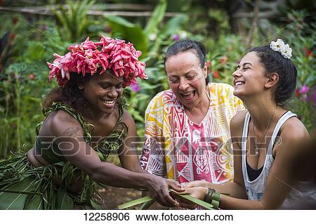 Tourists enjoying a cultural tour on Tanna Island; Tanna Island, Vanuatu View Large Photo Image Stock Photograph - Tourists enjoying a cultural tour on Tanna Island; Tanna Island, Vanuatu. Fotosearch