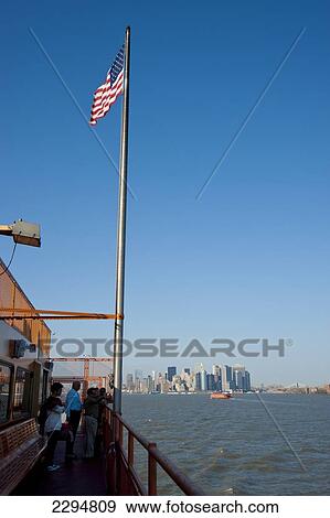 Stock Photo - Tourists Enjoying The Views Of Manhattan From The Staten Island Ferry, New York, Usa. Fotosearch