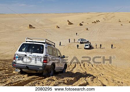 Tourists Exploring The Desert In 4X4 Vehicles; Tunisia, North Africa View Large Photo Image Stock Photography - Tourists Exploring The Desert In 4X4 Vehicles; Tunisia, North Africa. Fotosearch