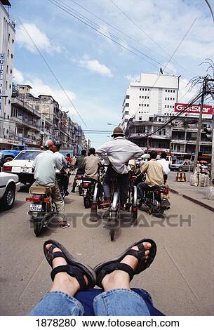 Tourist's Feet On A Rickshaw In A Busy Street Scene View Large Photo Image Stock Image - Tourist's Feet On A Rickshaw In A Busy Street Scene. Fotosearch