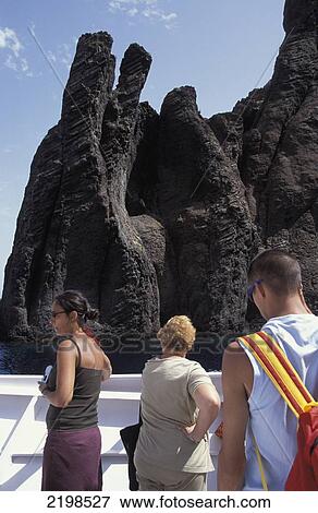 Stock Photo - Tourists In La Scandola Nature Reserve; Corsica. Fotosearch