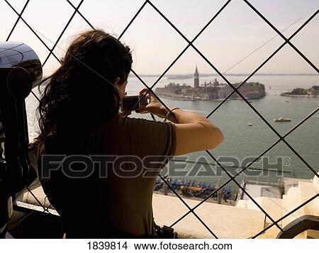 Picture - Tourists Looking At View, Church Of San Giorgio Maggiore In Background; Venice, Italy. Fotosearch