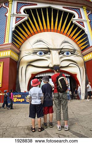 Tourists Outside Entrance To Funfair In St Kilda, Melbourne, Australia View Large Photo Image Stock Photo - Tourists Outside Entrance To Funfair In St Kilda, Melbourne, Australia. Fotosearch