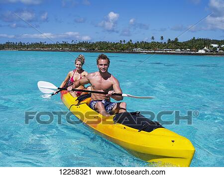 Tourists paddling in clear waters off Savaii Island; Savaii, Samoa View Large Photo Image Stock Image - Tourists paddling in clear waters off Savaii Island; Savaii, Samoa. Fotosearch