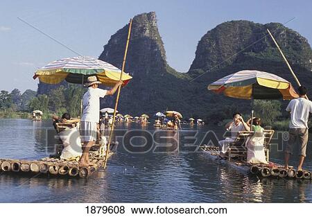 Stock Photo - Tourists Rafting On Yalong River. Fotosearch
