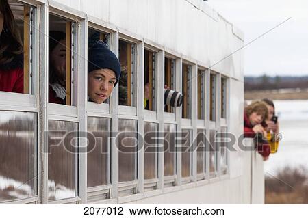 Stock Image - Tourists Sightseeing On A Tundra Vehicle; Churchill Manitoba Canada. Fotosearch