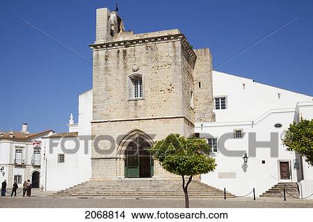 Picture - Tourists Stand Outside A Building With A Bell Tower; Faro Algarve Portugal. Fotosearch