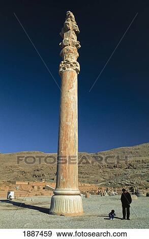 Tourists Standing Beside A Column View Large Photo Image Stock Photo - Tourists Standing Beside A Column. Fotosearch